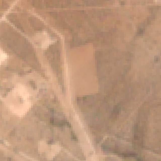 The same frame in September 2026: a graded pad filling the marked box.