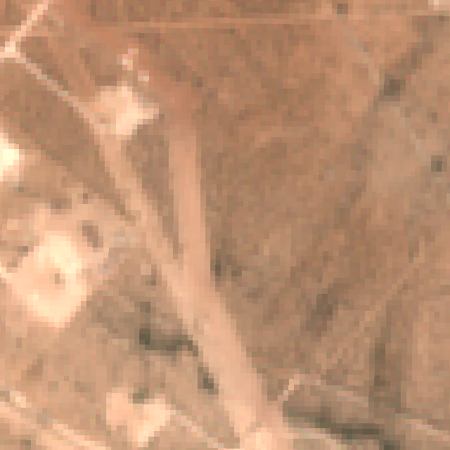The location in August 2026: open ground and tracks, nothing inside the marked box.